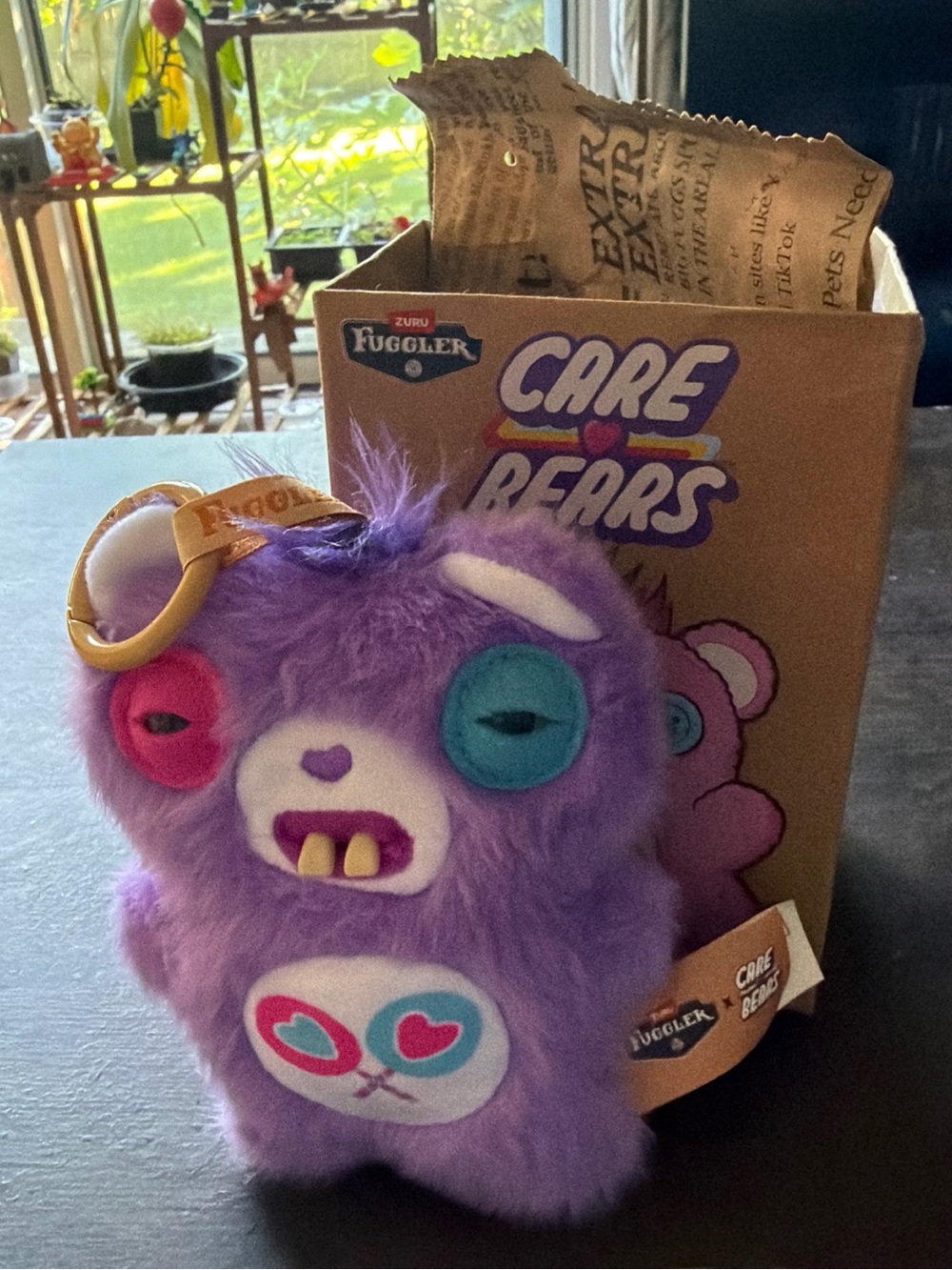 Fuggler Care Bears Purple Plush Keychain with Teal & Pink Eye Patches